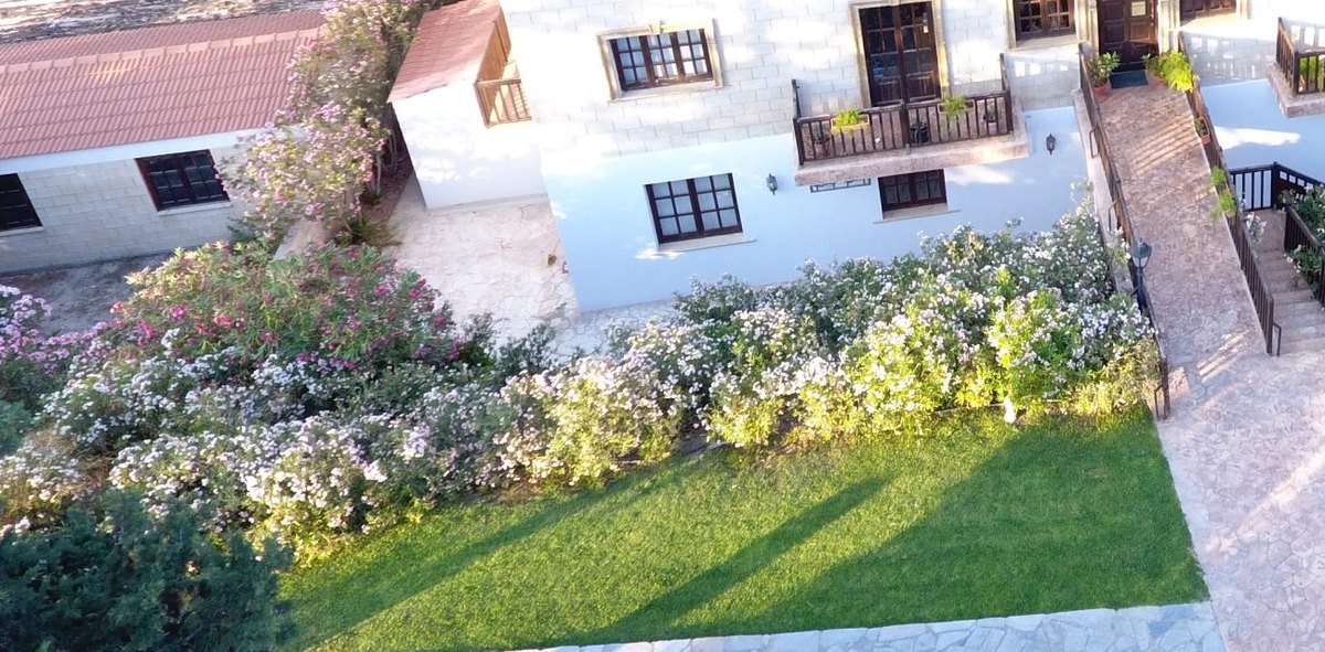 Flowering oleander borders and lawn beside the Da Vinci Centre